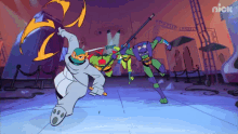 three teenage mutant ninja turtles are fighting with swords in a nick cartoon