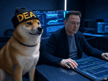 a dog wearing a dea hat sits next to a man sitting at a desk