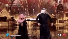 a man and a woman are dancing on a stage with the words arabs got talent written on the bottom