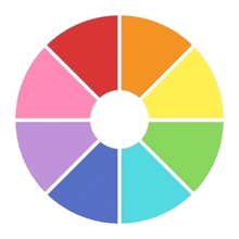 a rainbow colored circle divided into eight sections with a white center