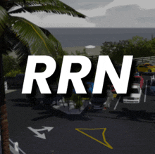 a sign that says rrn on it with a palm tree in the background