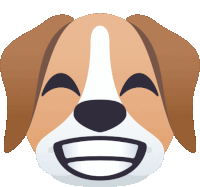 a brown and white dog with its eyes closed and a smile on its face