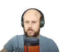 a bald man with a beard wearing headphones