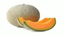 a cantaloupe is sitting next to a slice of cantaloupe .