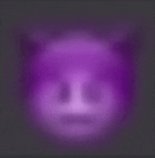 a blurry picture of a purple emoji face with horns on a black background .