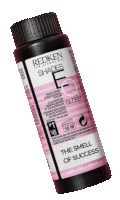 a bottle of redken shades the smell of success gloss