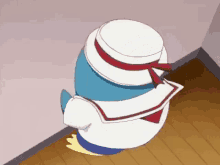 a cartoon penguin is wearing a white hat and a sailor suit .