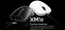 black and white xm1r precision redefined mouse on a black surface