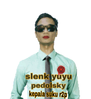 a man wearing sunglasses and a shirt that says ' slenk yuyu pedosky kepala suku r2p '