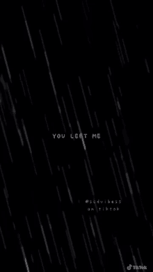 a black background with white rain drops and the words `` you left me '' .