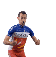 a man wearing a red and blue cofidis jersey smiles