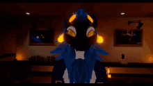 a cartoon character with blue feathers and yellow eyes is standing in a room