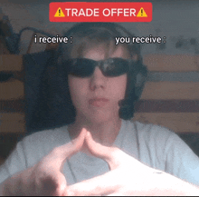 a man wearing headphones and sunglasses says trade offer