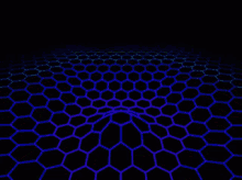 a black background with a pattern of hexagons that looks like a tunnel