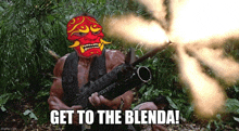 a man with a red mask on his face is holding a gun and says get to the blenda