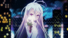 a girl with white hair and red eyes is holding a gun in her hand .