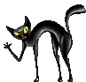 a black cat with yellow eyes is standing up on its hind legs on a white background .