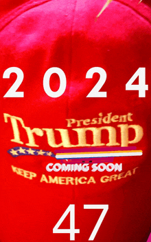 a red hat that says 2024 president trump coming soon keep america great and 47