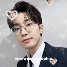 a young man wearing glasses and a suit has the name wonwoa de sophia on his face