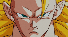 a close up of a dragon ball z character 's face with a serious look on his face