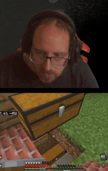 a man wearing headphones and glasses is playing a video game called minecraft