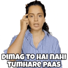 a woman in a blue striped shirt is pointing at her forehead and saying `` dimag to hai nahi tumhare paas '' .