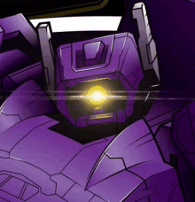 a close up of a purple robot with a yellow light on its head .