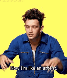 a man in a blue jumpsuit is saying now i 'm like an atheist