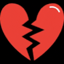 a broken red heart with a black crack in it on a black background .