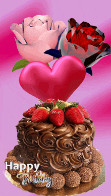 a chocolate cake with strawberries and a heart on top with the words happy birthday written below it