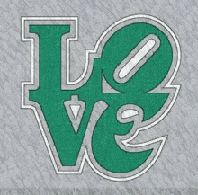 the word love is written in green and silver on a grey background