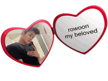 a heart shaped mirror with rowoon my beloved on it