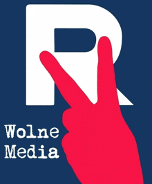 a logo for wolne media with a red hand pointing