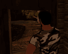 a man in a camo shirt looks out a doorway