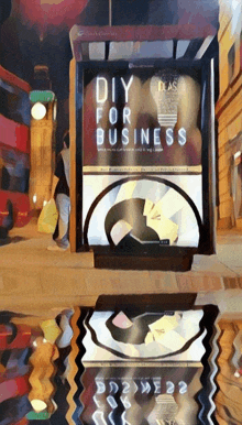 a sign that says diy for business is reflected in a mirror