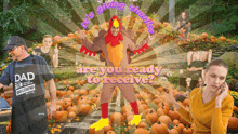 a man in a turkey costume is standing in front of pumpkins with the words " are you ready to receive "