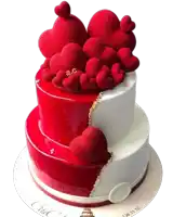 a red and white cake with hearts on top and the letters a.c. on it