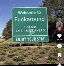 a green sign that says welcome to fuckaround on it