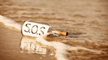 a bottle with a label that says sos on it