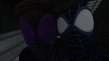 a couple of spider-man standing next to each other in the dark