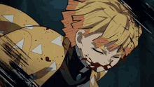 a yellow haired anime character with blood on his face