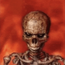 a skeleton is standing in front of a red background with flames behind it .