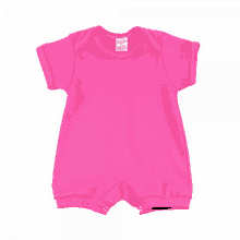 a baby 's pink outfit has a label that says ' baby basics ' on it