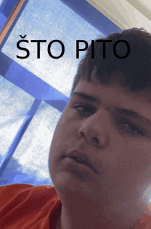 a man 's face is shown with the words sto pito written above him