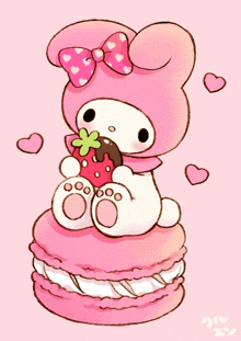 a drawing of a pink bunny eating a strawberry