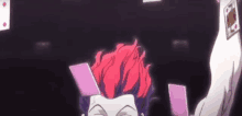 a cartoon character with red hair is holding a bunch of playing cards .