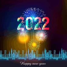 a happy new year greeting card with fireworks displayed in the background