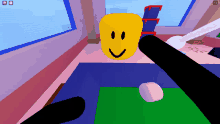 a screenshot of a video game shows a yellow face with a smile on it