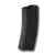 a black object is sitting on a white surface .