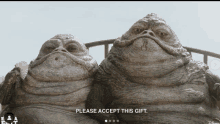 a picture of two frogs with the words please accept this gift at the bottom